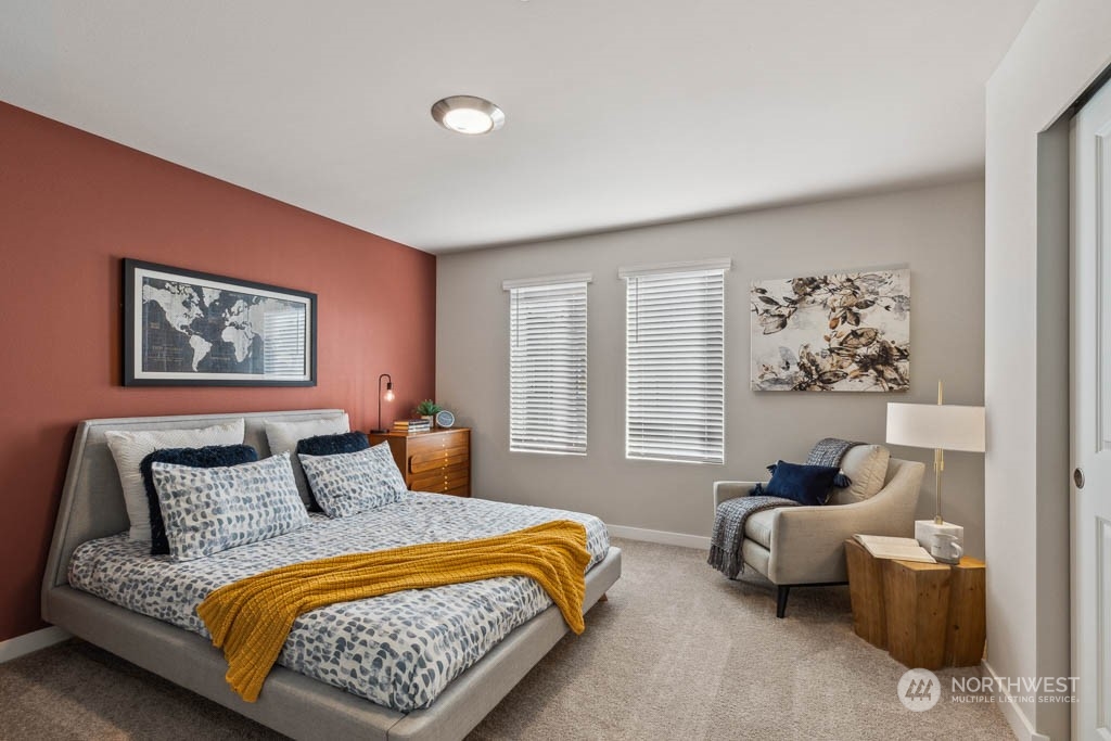 9616 19th Avenue Southeast, Unit E Everett, WA 98208 - Photo 15 of 17 a bedroom with furniture and windows