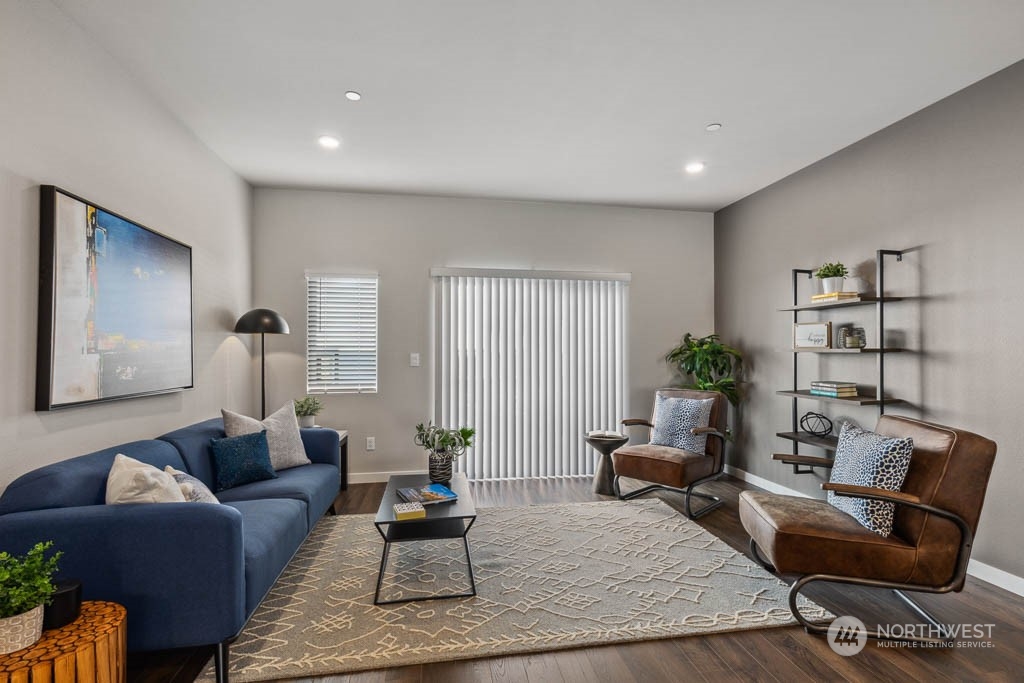 9616 19th Avenue Southeast, Unit E Everett, WA 98208 - Photo 3 of 17 a living room with furniture and wooden floor