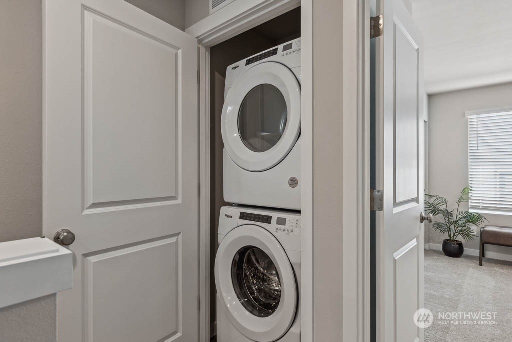 9616 19th Avenue Southeast, Unit E Everett, WA 98208 - Photo 10 of 17 a view of a hallway with washer and dryer