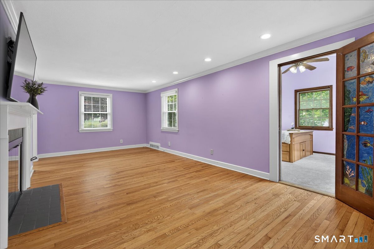 1006 King Road Cheshire, CT 06410 - Photo 12 of 40 Oversized windows let the light stream in and are among the many wonderful updates in this home!