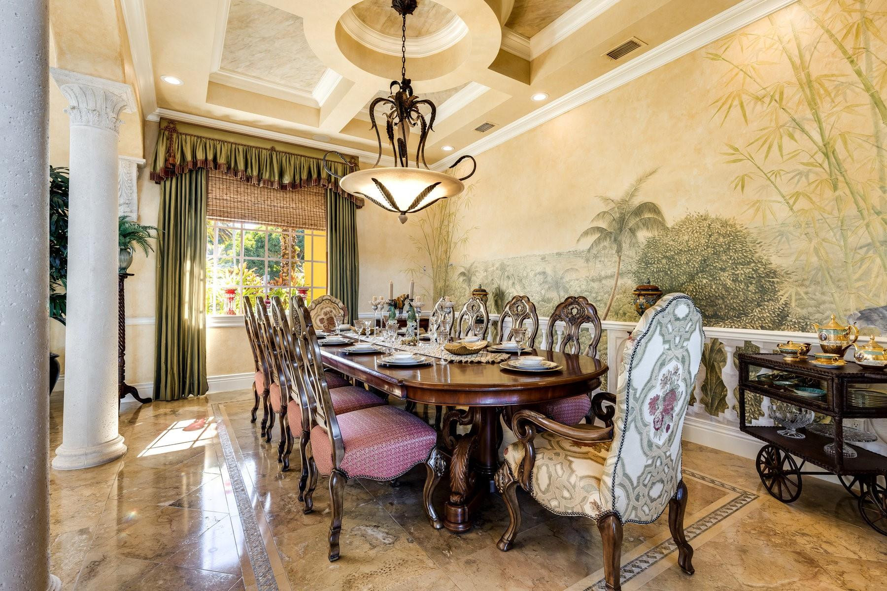 4089 Southeast Old St Lucie Boulevard Stuart, FL 34996 - Photo 12 of 99 a dining room with furniture and wooden floor