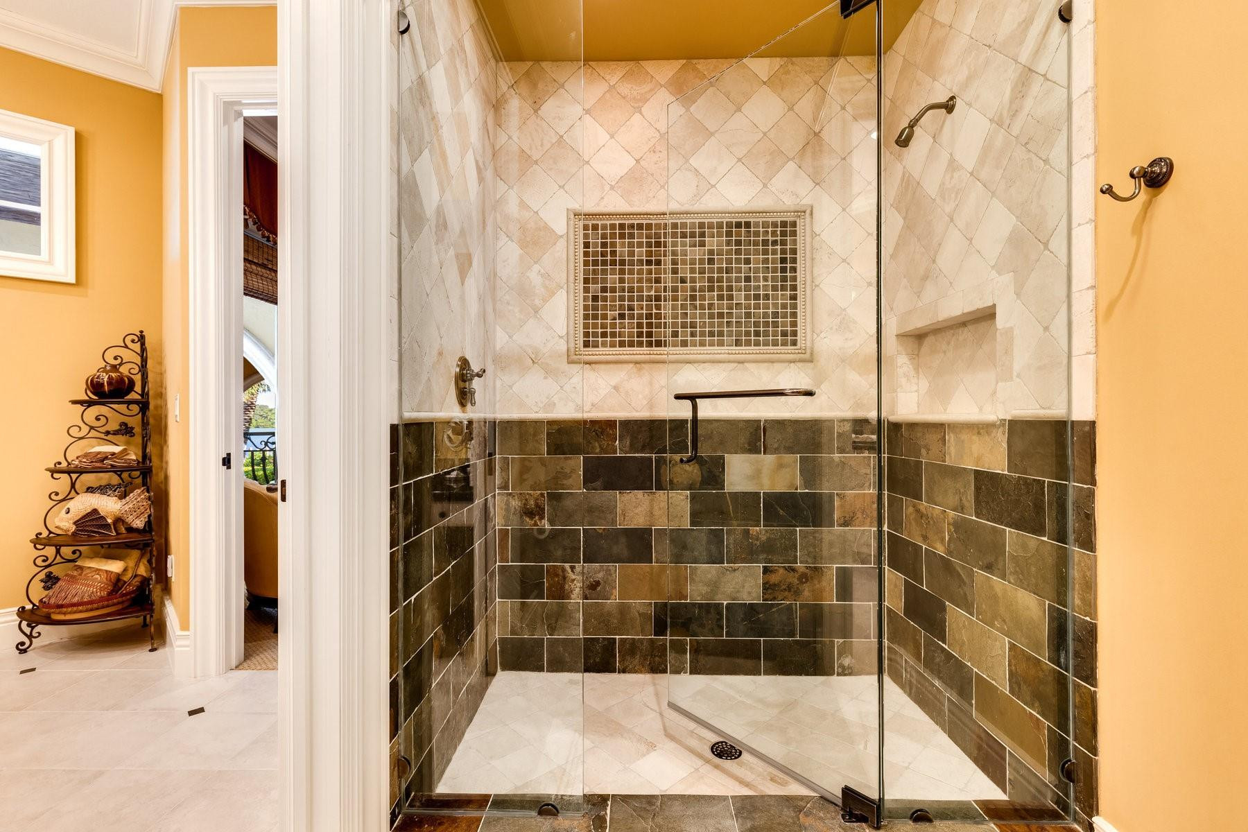 4089 Southeast Old St Lucie Boulevard Stuart, FL 34996 - Photo 75 of 99 a bathroom with a shower