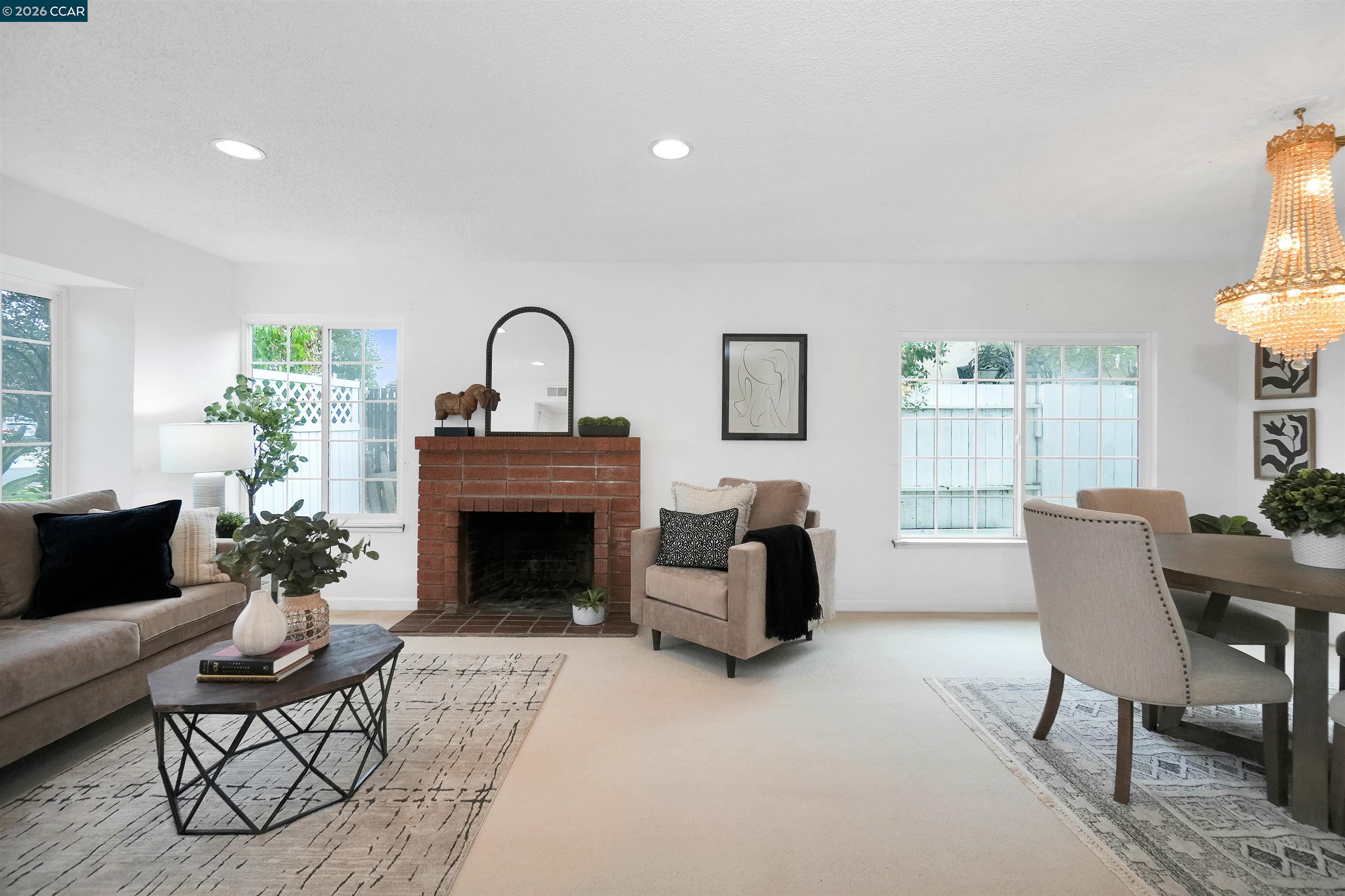 922 Coral Drive Rodeo, CA 94572 - Photo 17 of 59 a living room with furniture and a fireplace