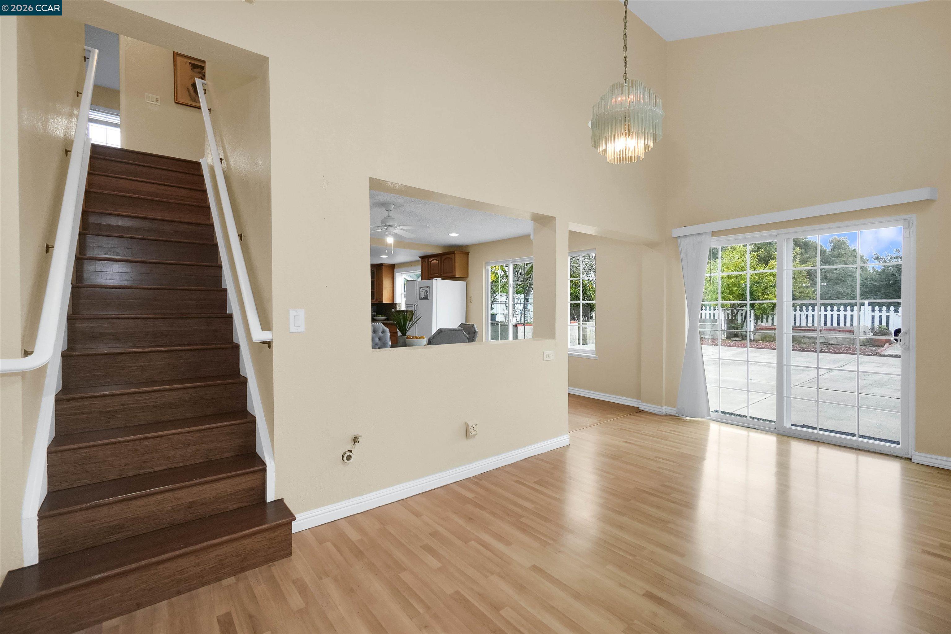922 Coral Drive Rodeo, CA 94572 - Photo 29 of 59 a view of an entryway with wooden floor and staircase