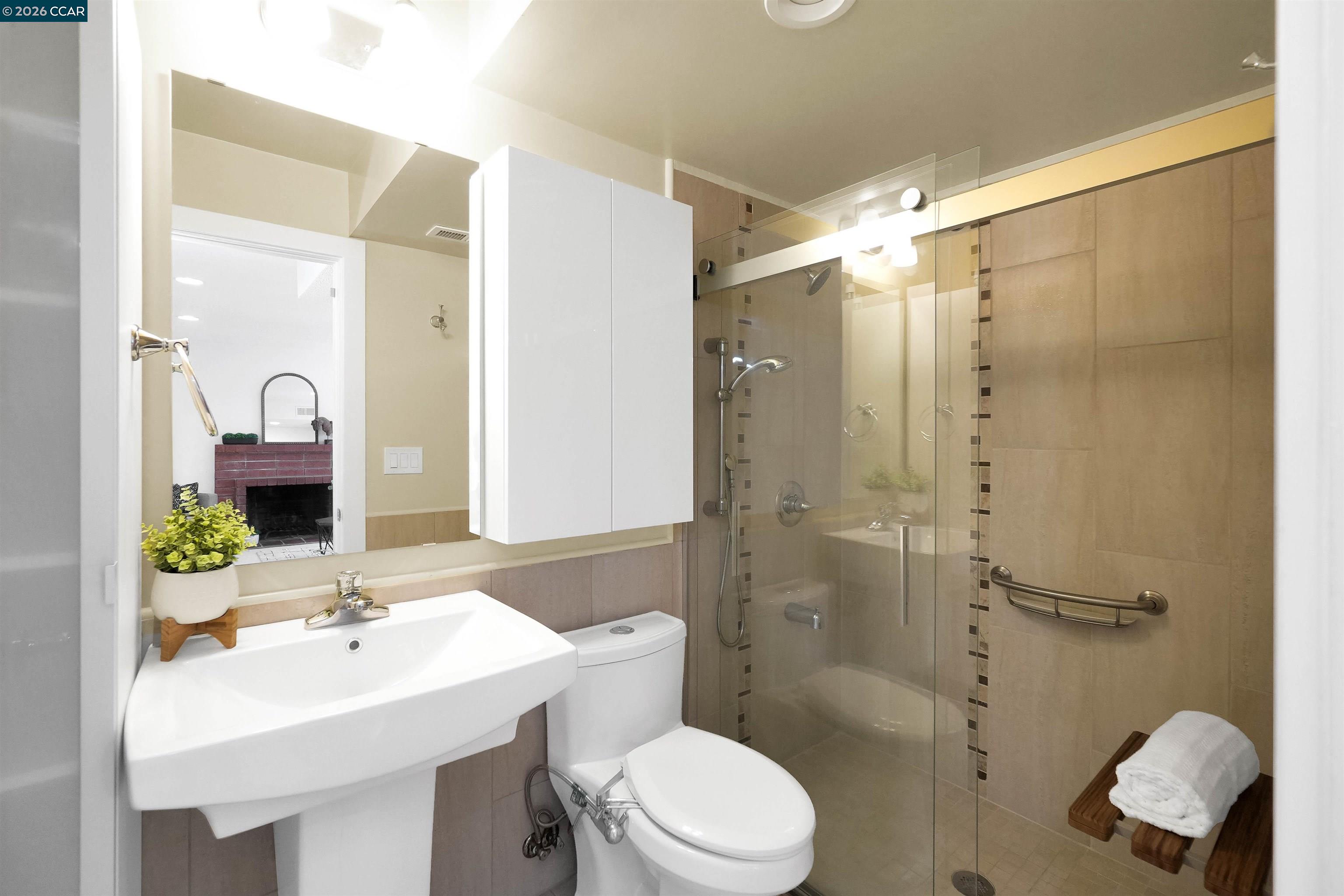 922 Coral Drive Rodeo, CA 94572 - Photo 31 of 59 a bathroom with a sink toilet and shower