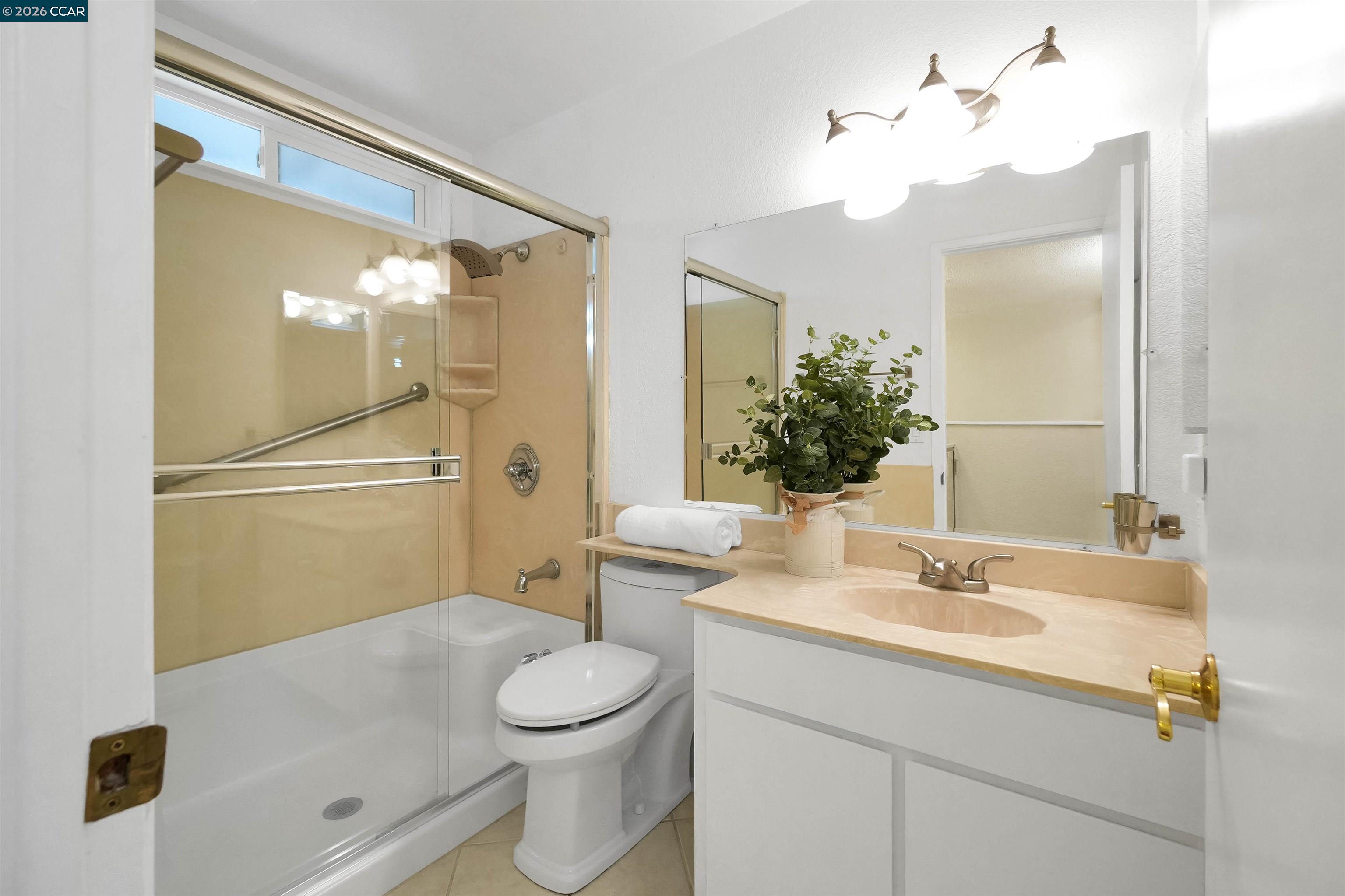 922 Coral Drive Rodeo, CA 94572 - Photo 35 of 59 a bathroom with a sink a toilet and shower