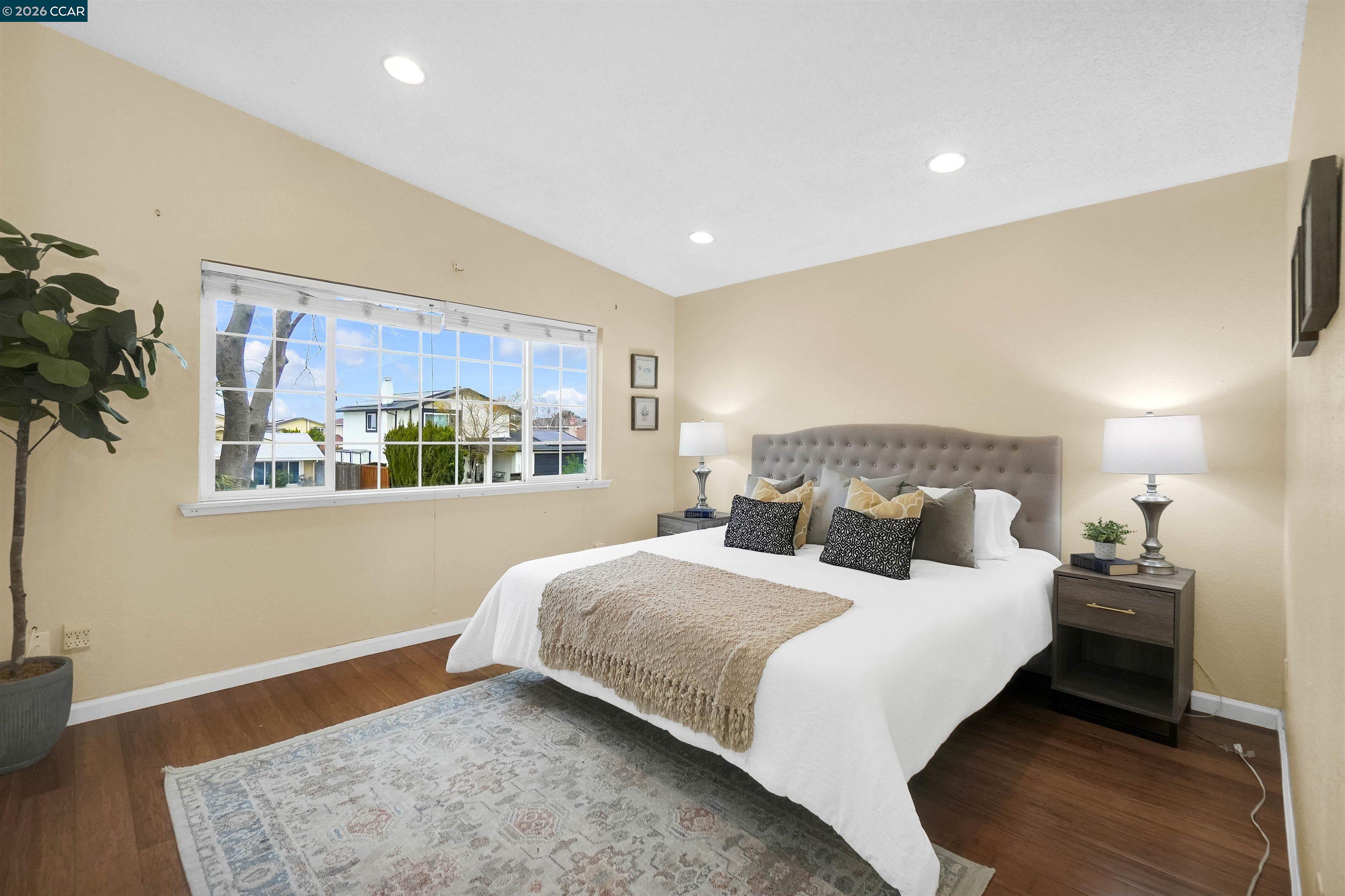 922 Coral Drive Rodeo, CA 94572 - Photo 36 of 59 a bedroom with a bed and a window