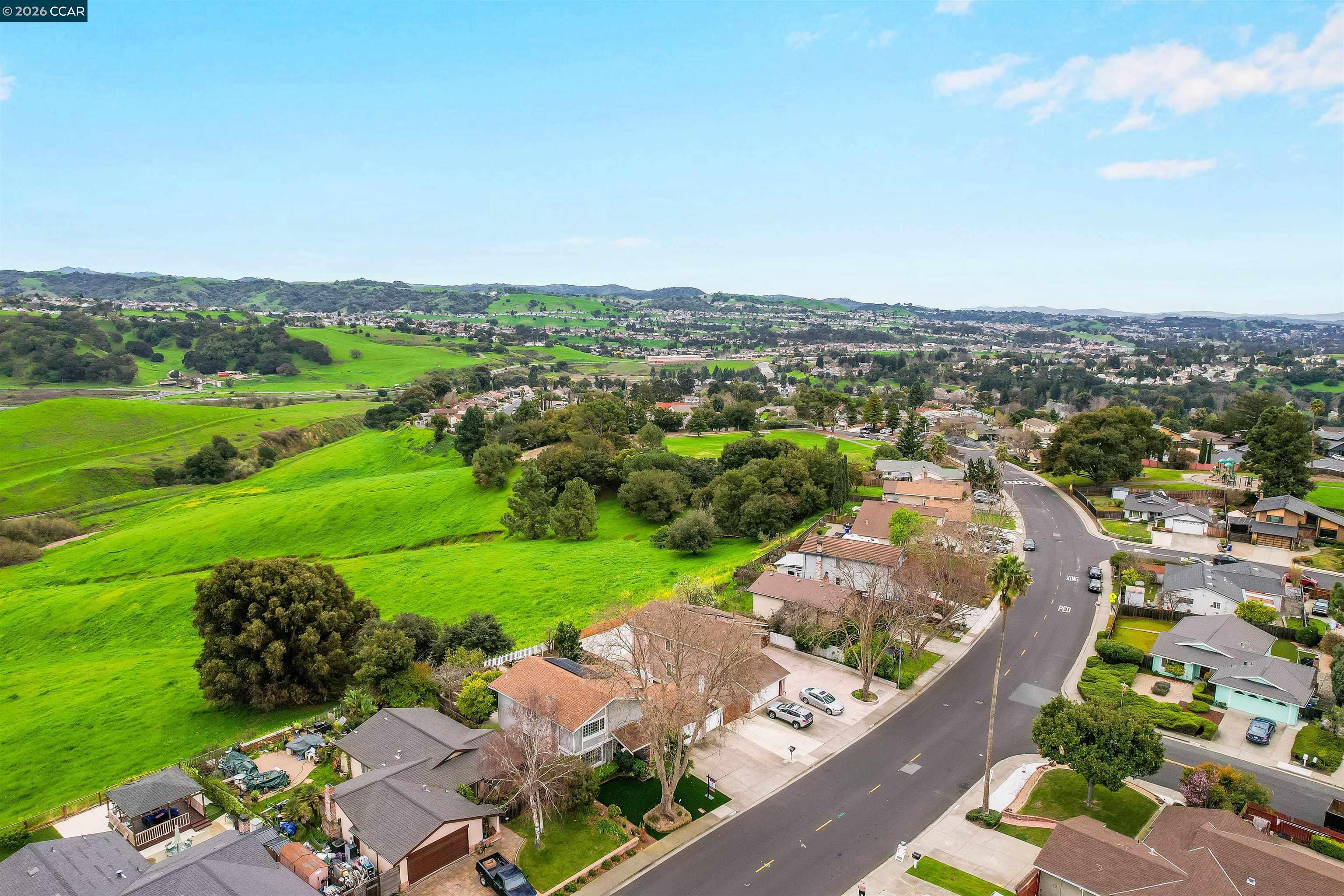 922 Coral Drive Rodeo, CA 94572 - Photo 59 of 59 an aerial view of a city with lots of residential buildings and mountain view in back
