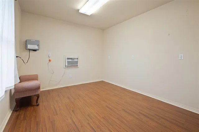 a view of livingroom with hardwood and furniture