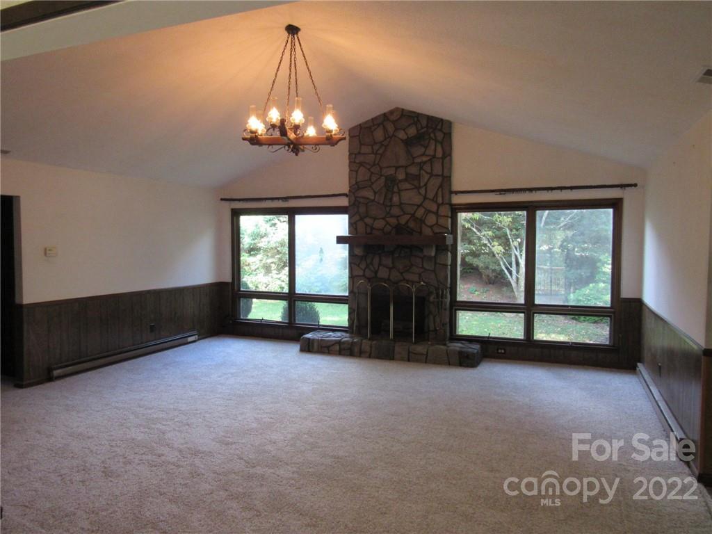 31 Ridgeline Road Clyde, NC 28721 - Photo 10 of 48 a view of a room with windows and ceiling fan