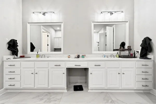 a bedroom with a bed and a walk in closet