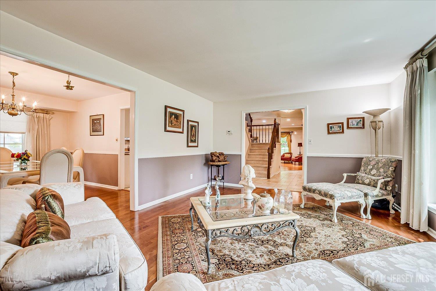 2 Pine Ridge Drive Edison, NJ 08820 - Photo 11 of 50 a living room with furniture and wooden floor