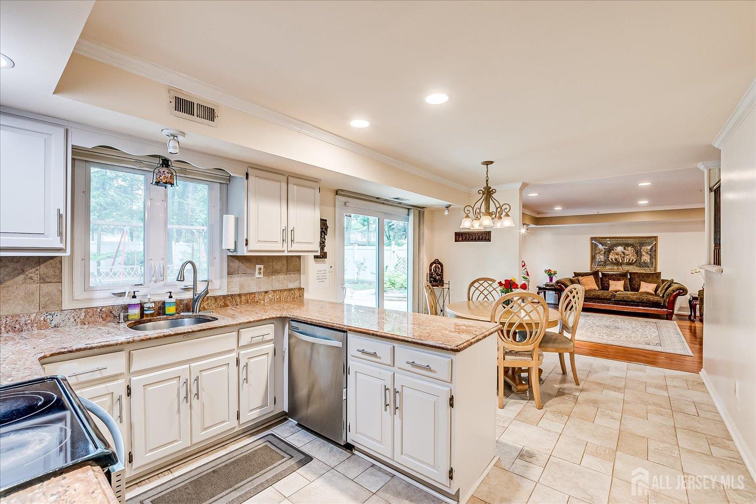 2 Pine Ridge Drive Edison, NJ 08820 - Photo 14 of 50 a kitchen with a sink cabinets and window