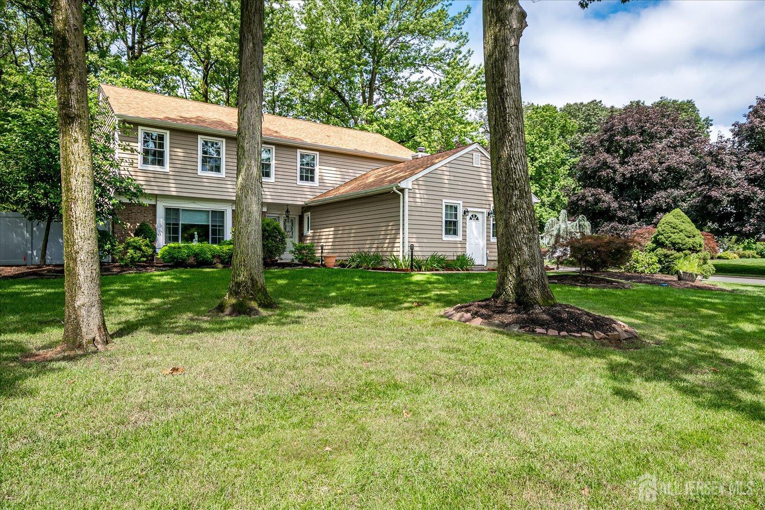 2 Pine Ridge Drive Edison, NJ 08820 - Photo 2 of 50 a view of backyard of house with green space