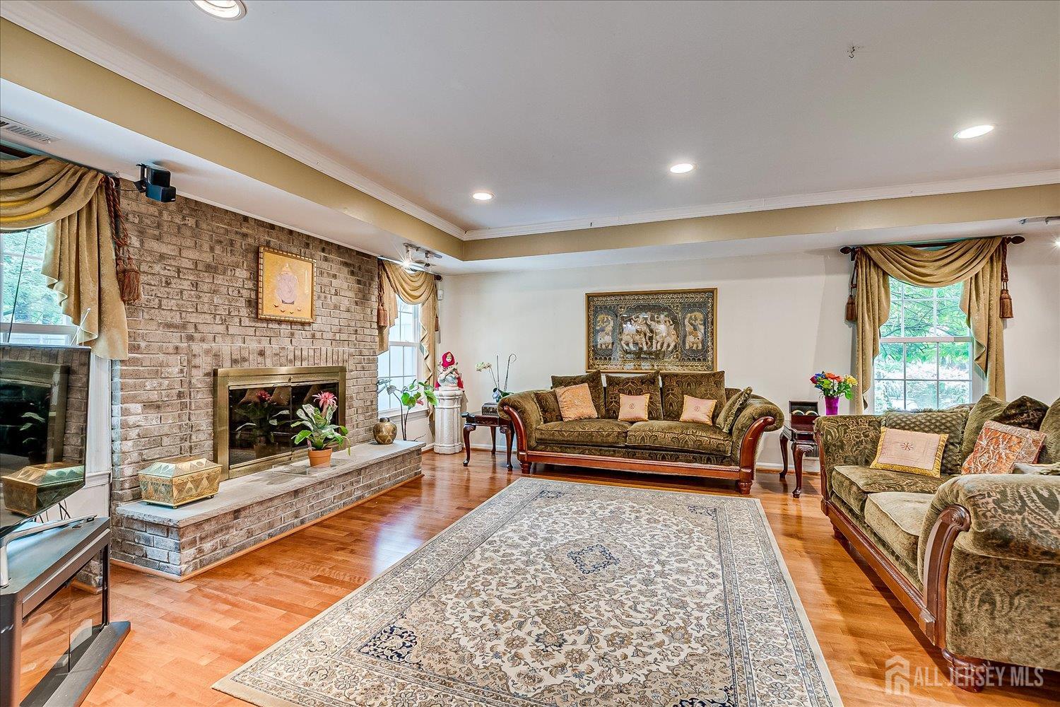 2 Pine Ridge Drive Edison, NJ 08820 - Photo 21 of 50 a living room with furniture and a fireplace