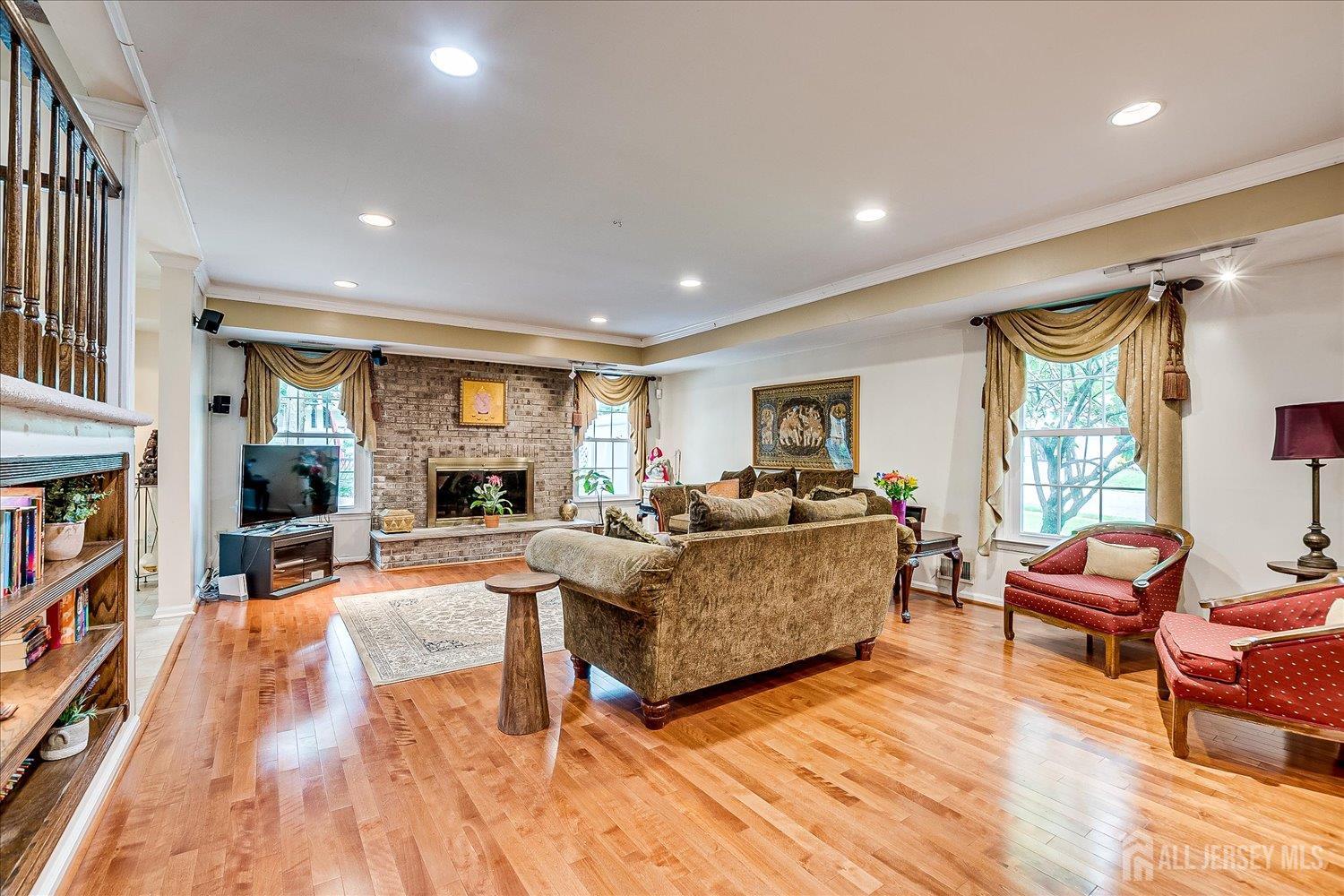 2 Pine Ridge Drive Edison, NJ 08820 - Photo 22 of 50 a living room with fireplace furniture and a wooden floor