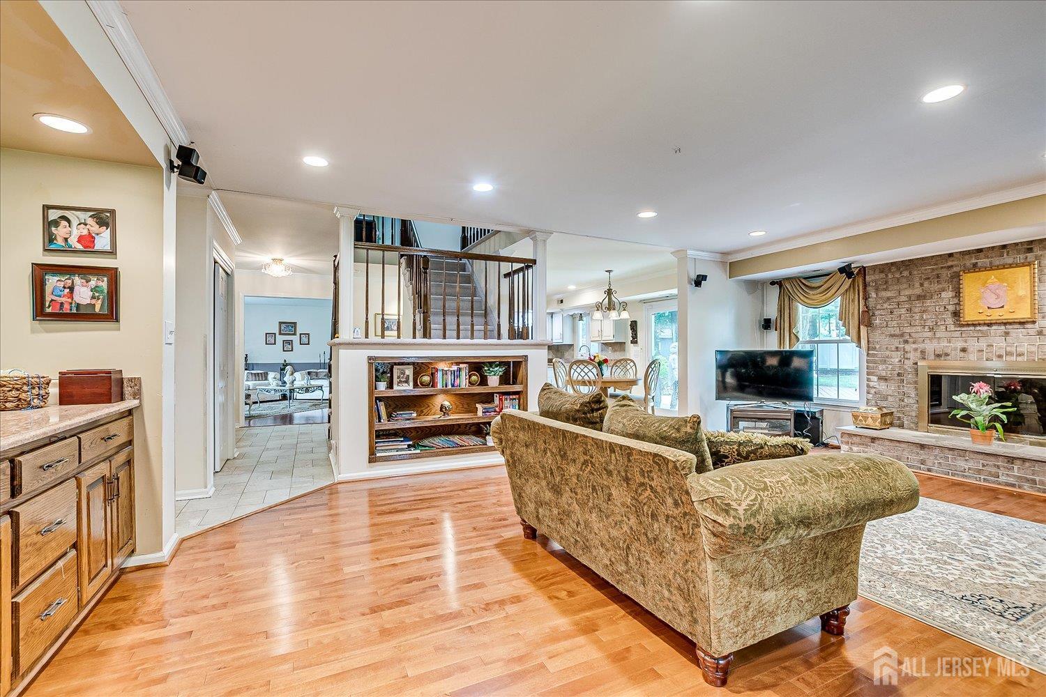 2 Pine Ridge Drive Edison, NJ 08820 - Photo 23 of 50 a living room with furniture and a flat screen tv