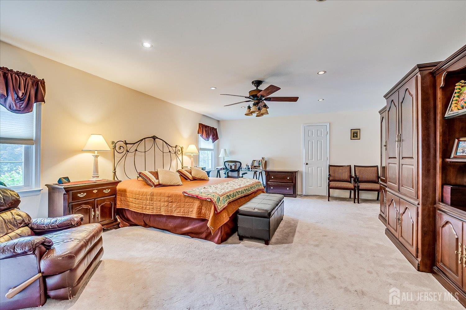 2 Pine Ridge Drive Edison, NJ 08820 - Photo 30 of 50 a bedroom with furniture and a chandelier