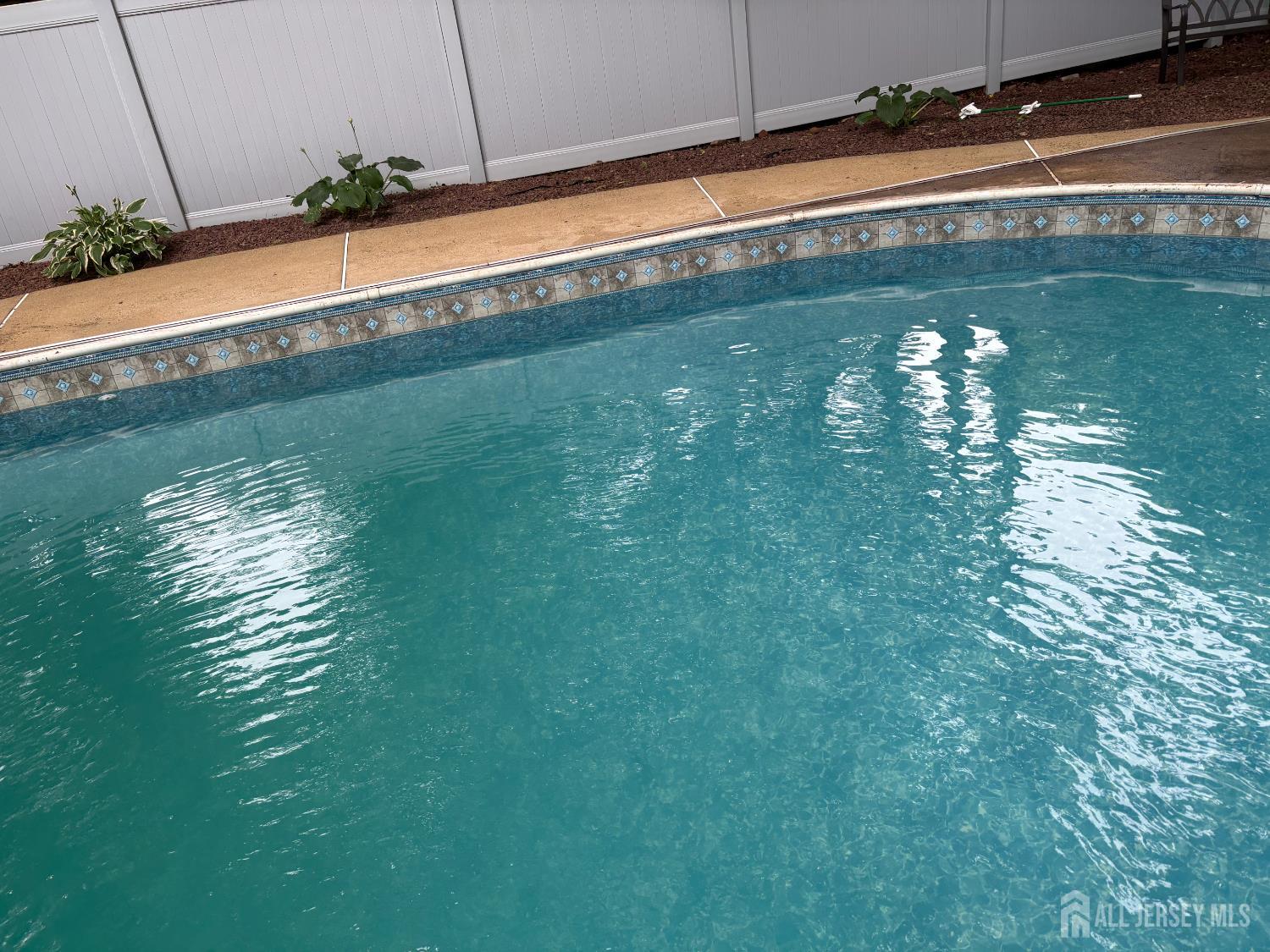 2 Pine Ridge Drive Edison, NJ 08820 - Photo 44 of 50 a close up of a lake view