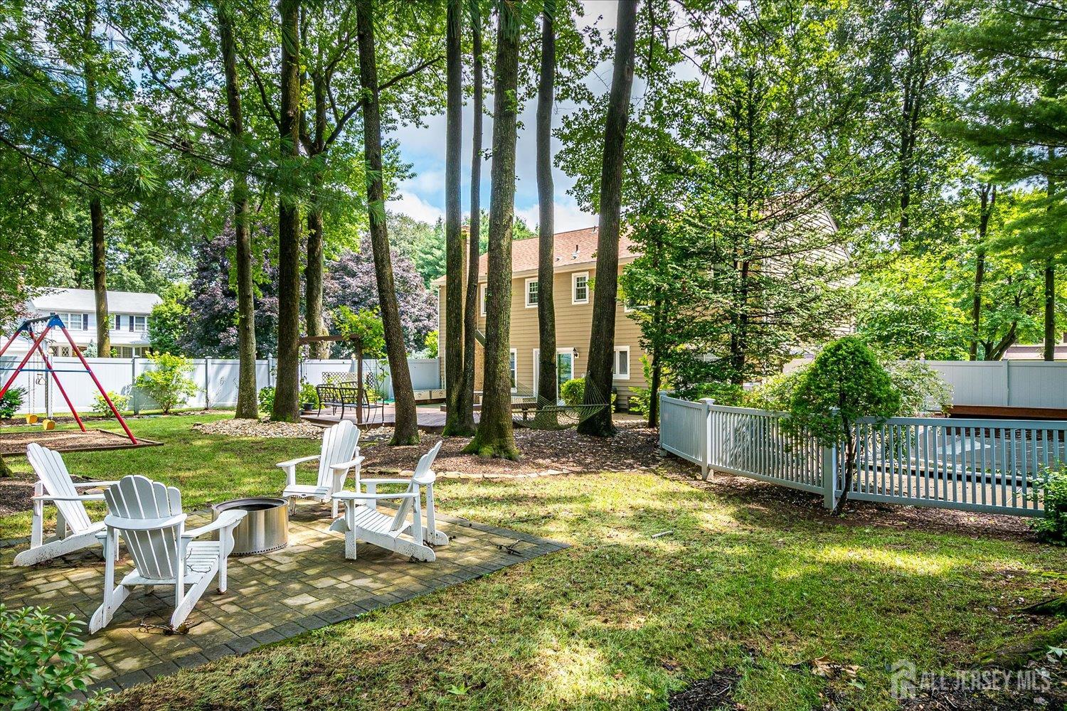 2 Pine Ridge Drive Edison, NJ 08820 - Photo 48 of 50 a view of a park with trees in the background