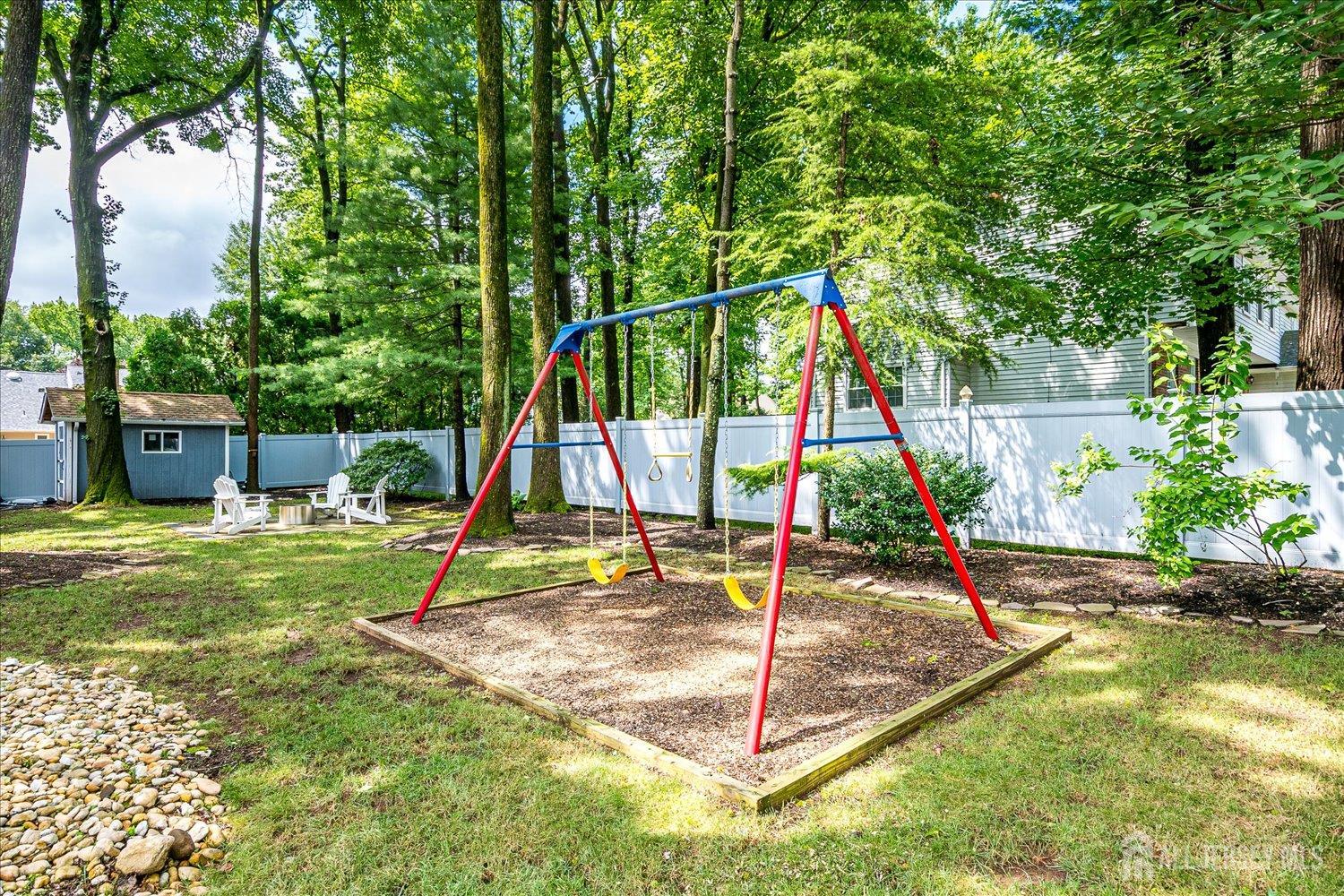 2 Pine Ridge Drive Edison, NJ 08820 - Photo 50 of 50 a view of a backyard with a slide