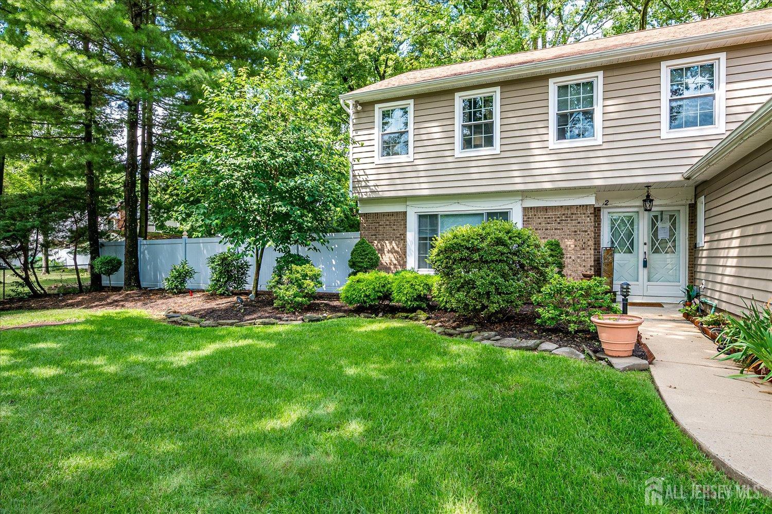 2 Pine Ridge Drive Edison, NJ 08820 - Photo 7 of 50 a view of a house with backyard and sitting area