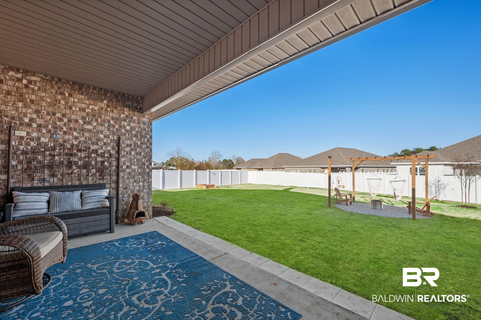 24891 Spectacular Bid Loop Daphne, AL 36526 - Photo 5 of 51 View of yard featuring a patio and an outdoor hangout area