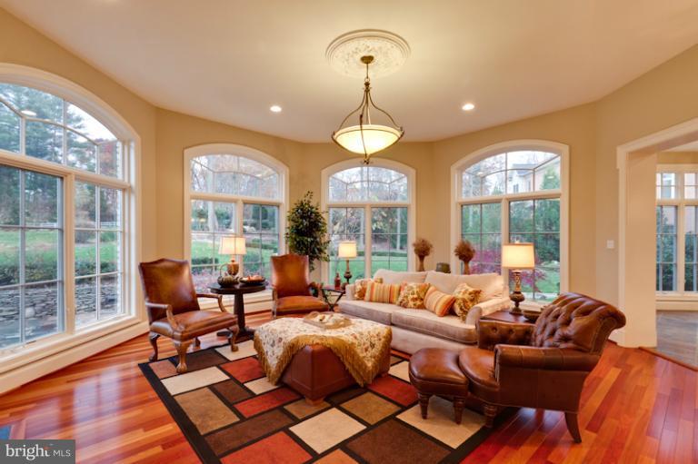 903 Georgetown Ridge Court McLean, VA 22102 - Photo 11 of 27 a living room with furniture and a large window
