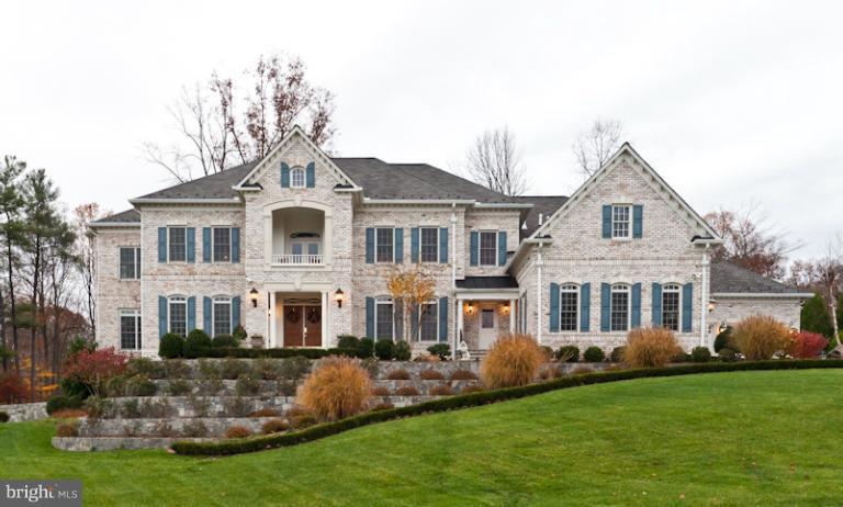903 Georgetown Ridge Court McLean, VA 22102 - Photo 24 of 27 a front view of a house with a yard