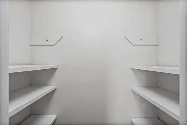 a hallway with closet