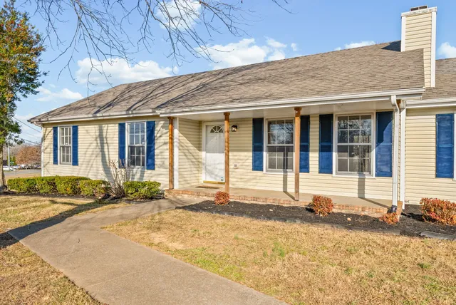 a front view of a house with a patio