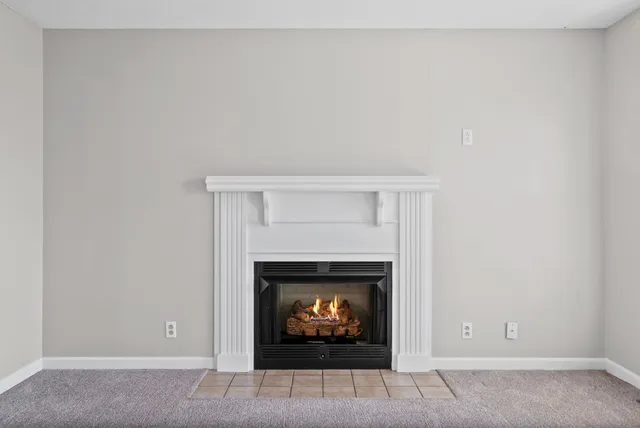 a living room with a fireplace