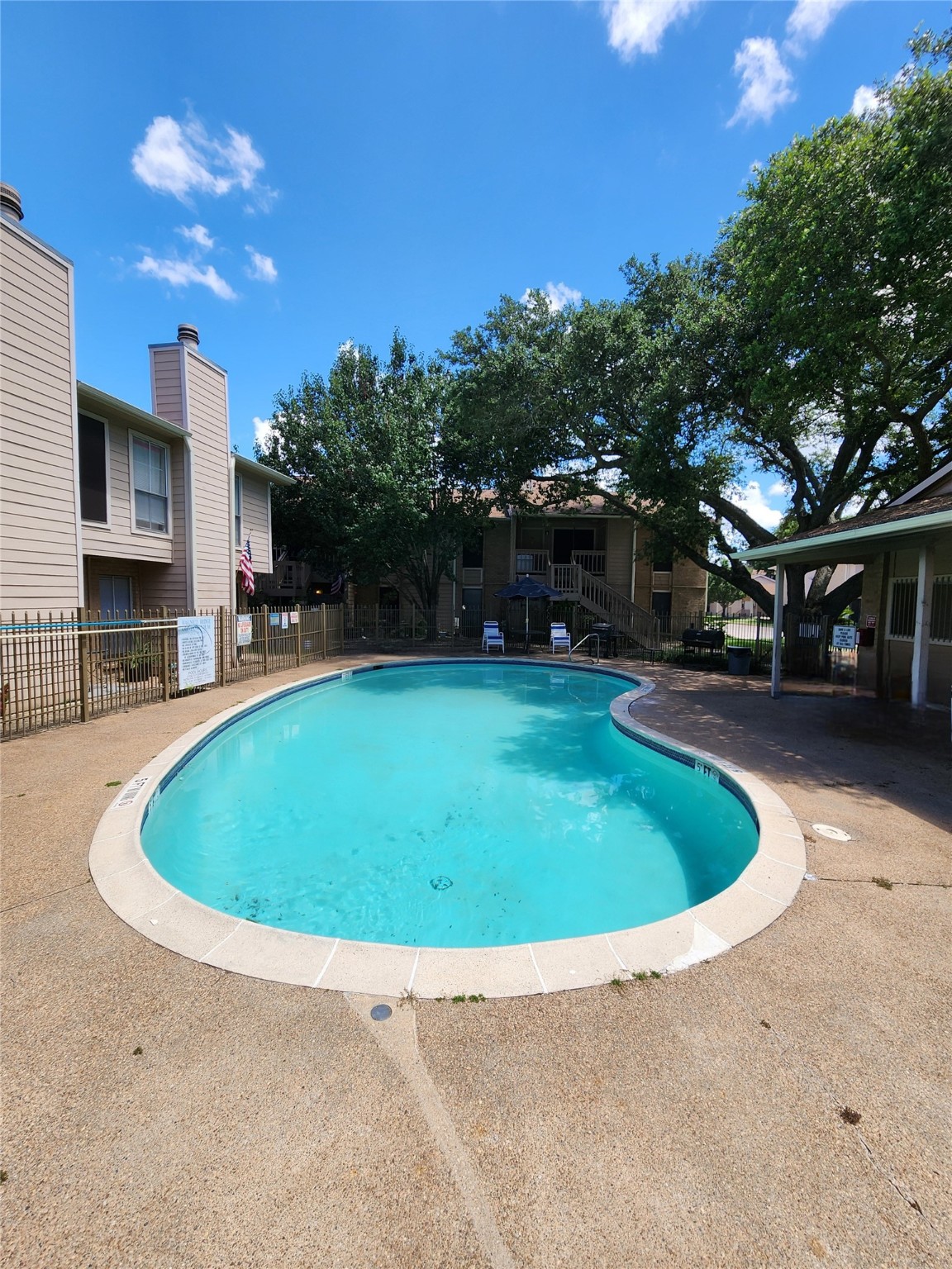 1505 Ward Road, Unit 161 Baytown, TX 77520 - Photo 10 of 10 a view of outdoor space yard swimming pool and outdoor seating