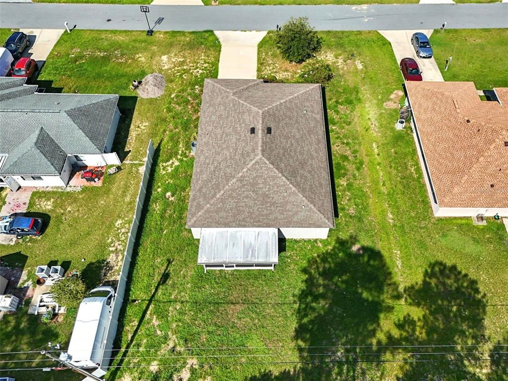 3381 Southwest 129th Loop Ocala, FL 34473 - Photo 30 of 35 an aerial view of a house with a yard