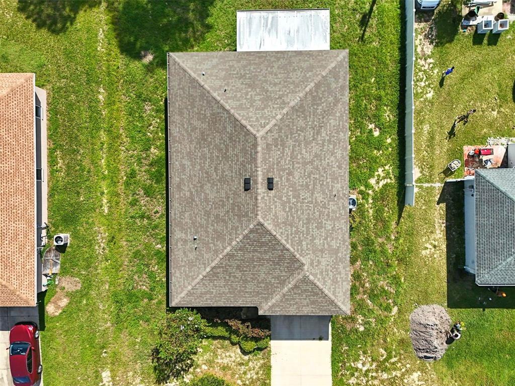 3381 Southwest 129th Loop Ocala, FL 34473 - Photo 31 of 35 front view of a house with a yard