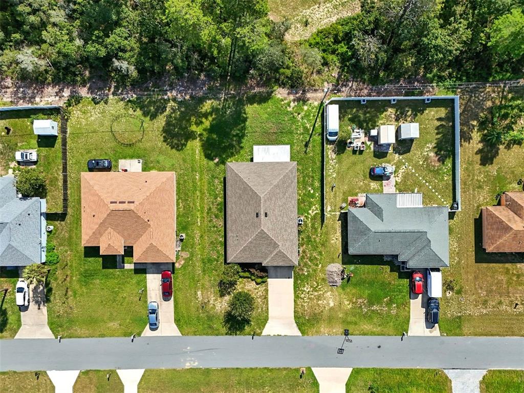 3381 Southwest 129th Loop Ocala, FL 34473 - Photo 32 of 35 an aerial view of a house
