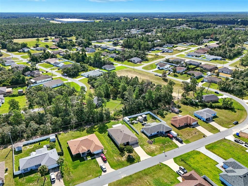 3381 Southwest 129th Loop Ocala, FL 34473 - Photo 33 of 35 an aerial view of residential houses with outdoor space
