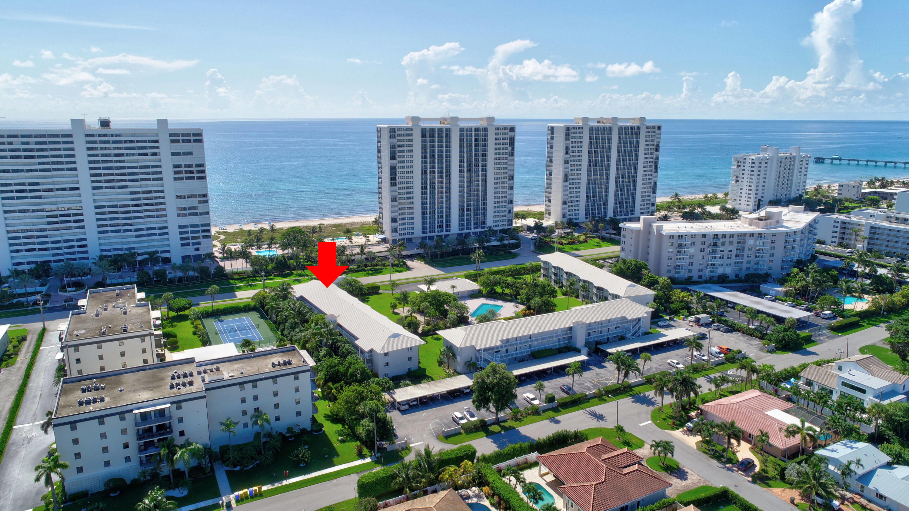 2700 Banyan Road, Unit 2C Boca Raton, FL 33432 - Photo 2 of 33 a garden view with sitting space