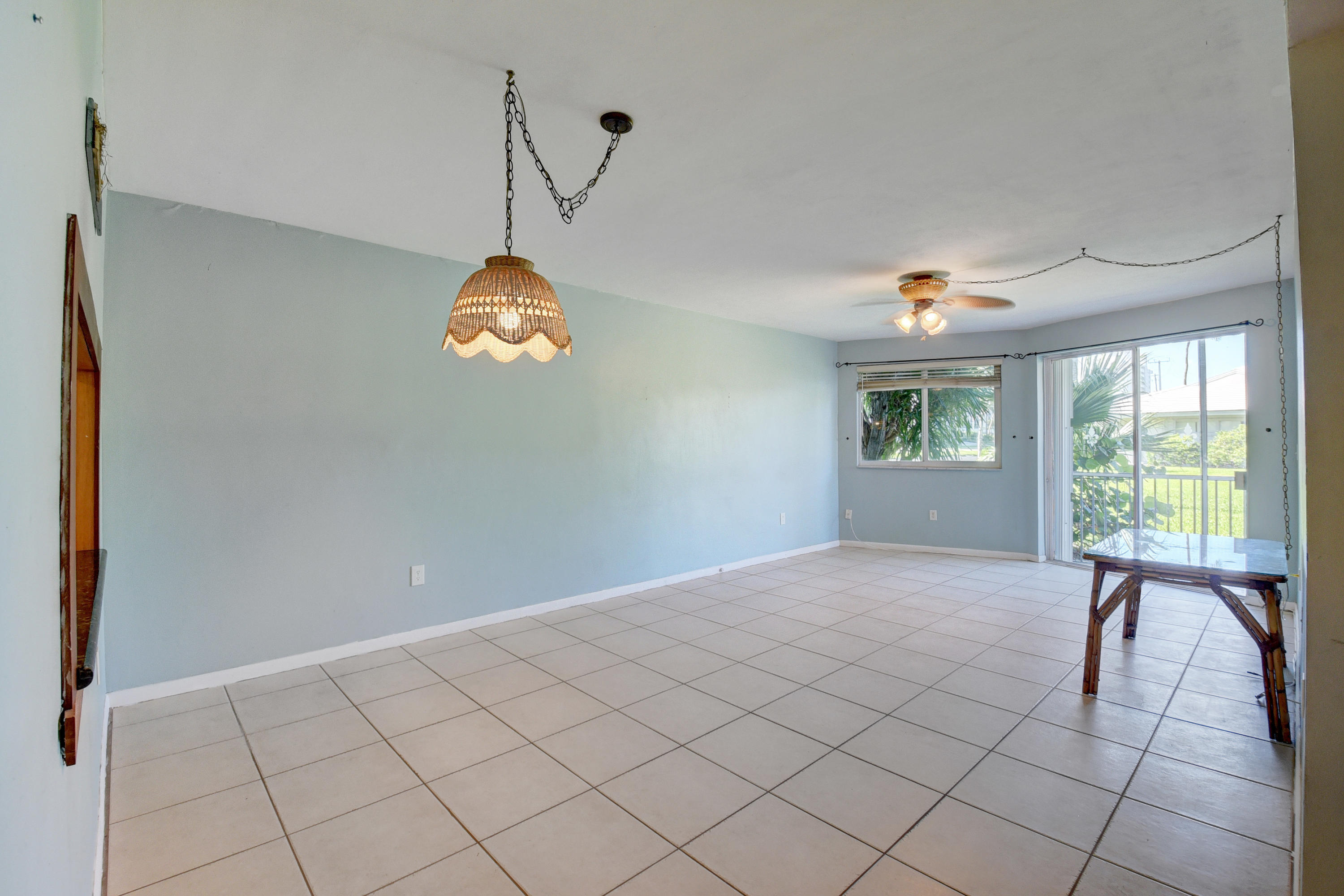 2700 Banyan Road, Unit 2C Boca Raton, FL 33432 - Photo 13 of 33 a view of an empty room with a window
