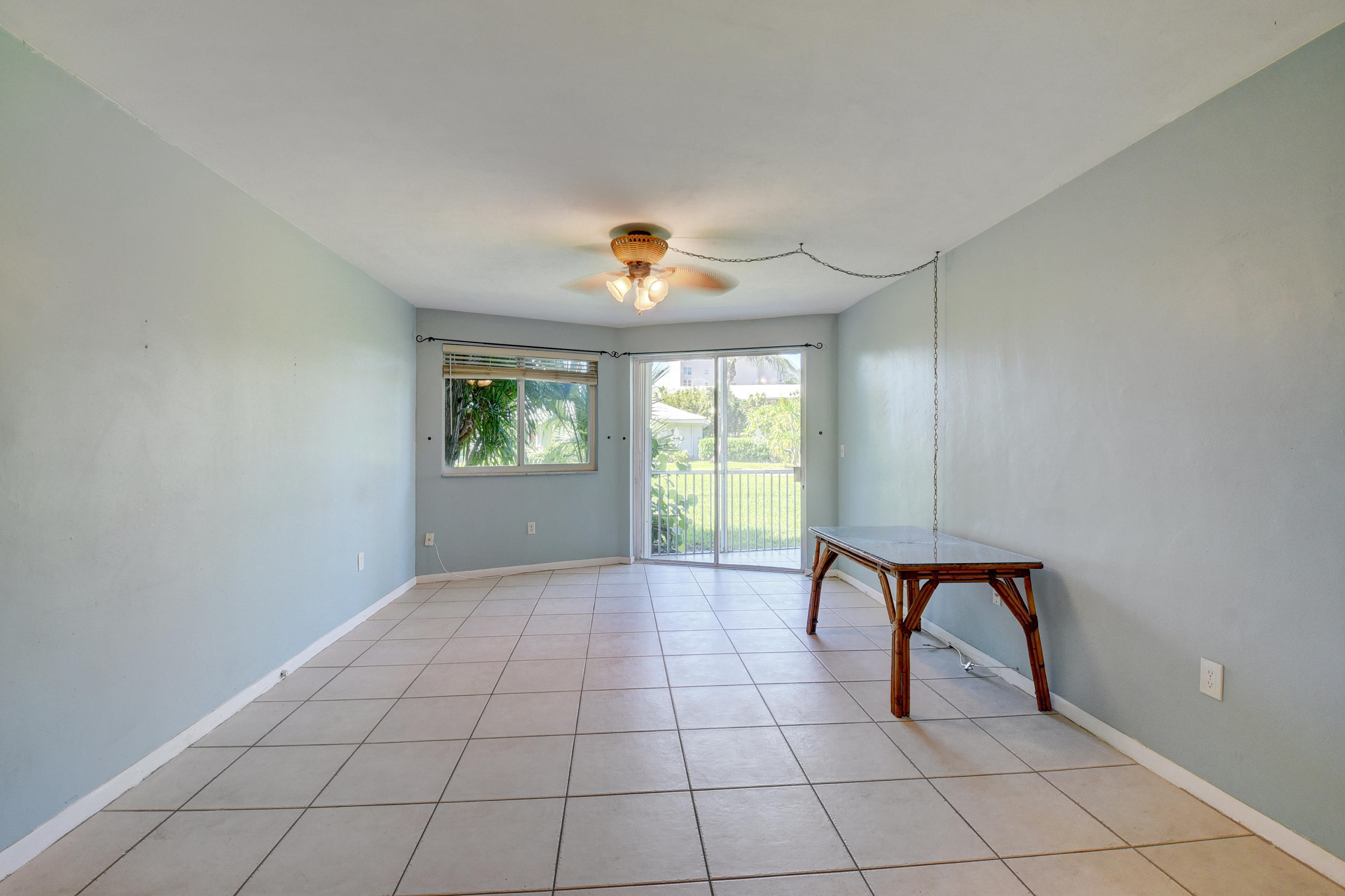 2700 Banyan Road, Unit 2C Boca Raton, FL 33432 - Photo 15 of 33 a view of an empty room with a window