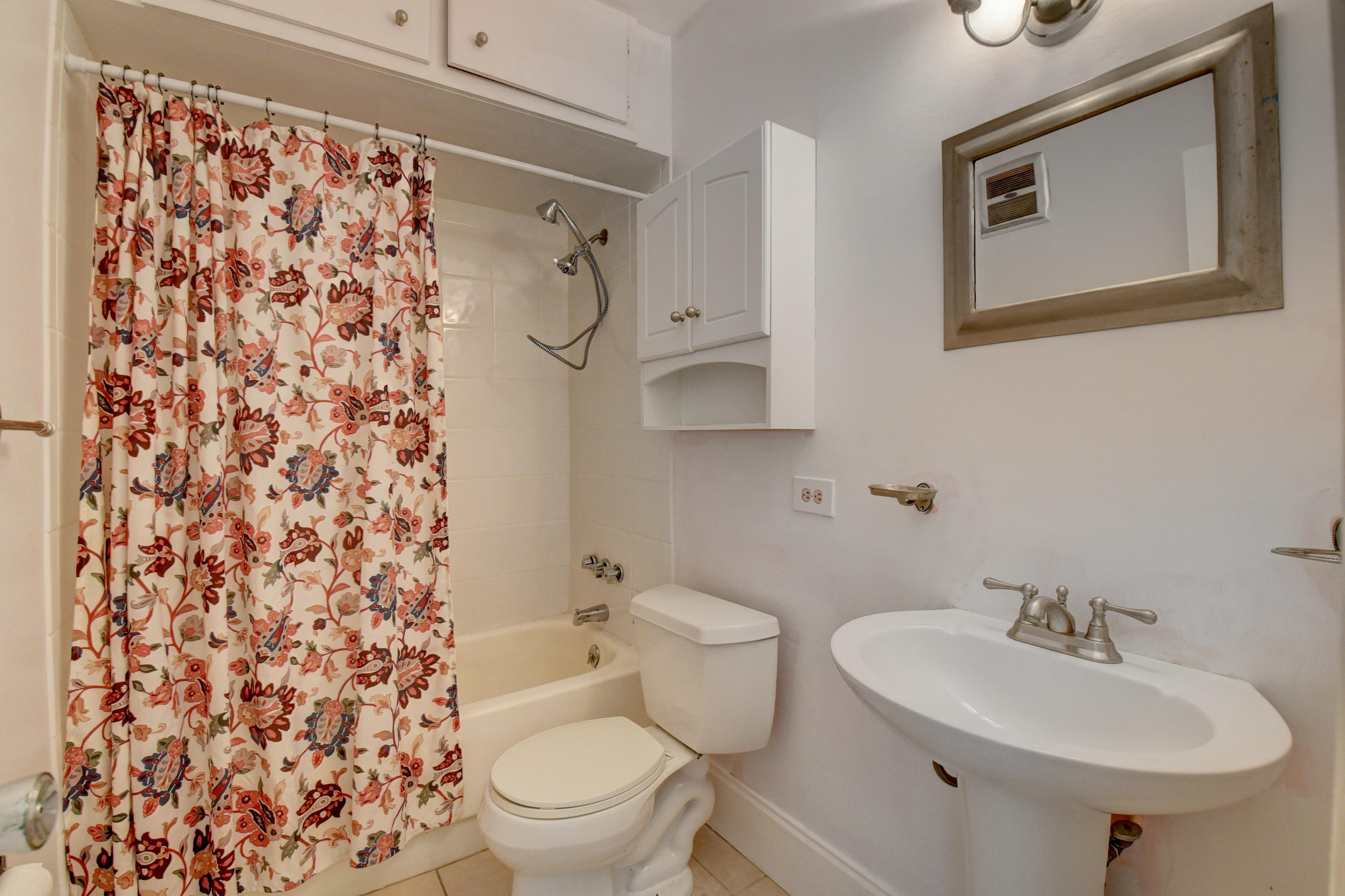 2700 Banyan Road, Unit 2C Boca Raton, FL 33432 - Photo 25 of 33 a bathroom with a sink toilet and shower
