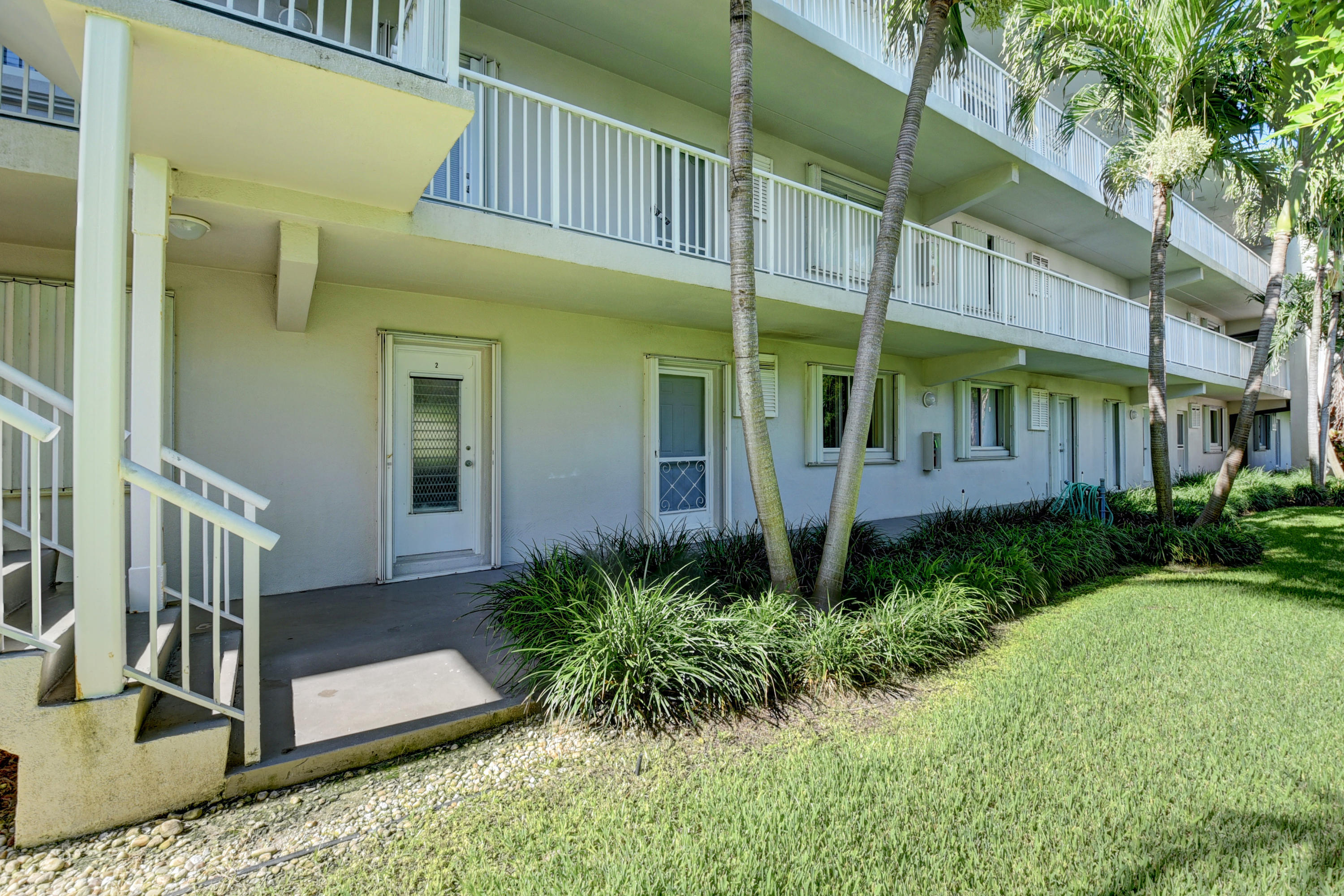 2700 Banyan Road, Unit 2C Boca Raton, FL 33432 - Photo 10 of 33 a view of a house with a yard balcony and plants