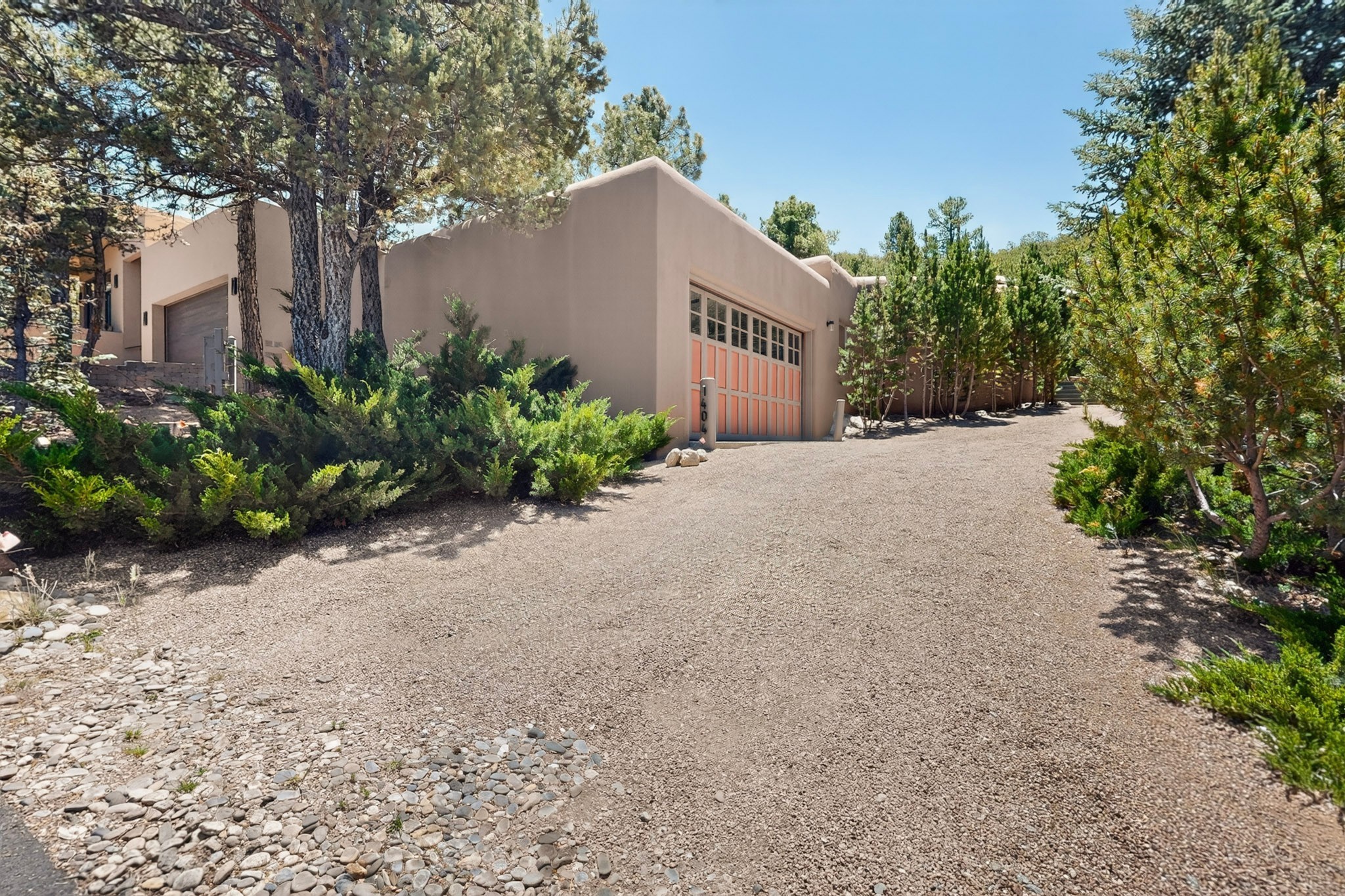 1404 Tesuque Creek Road Santa Fe, NM 87501 - Photo 10 of 55 Driveway up to the front portal and garage