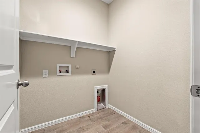 a spacious bathroom with a granite countertop sink a mirror and a bathtub