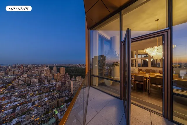 a view of a lobby with furniture and floor to ceiling window