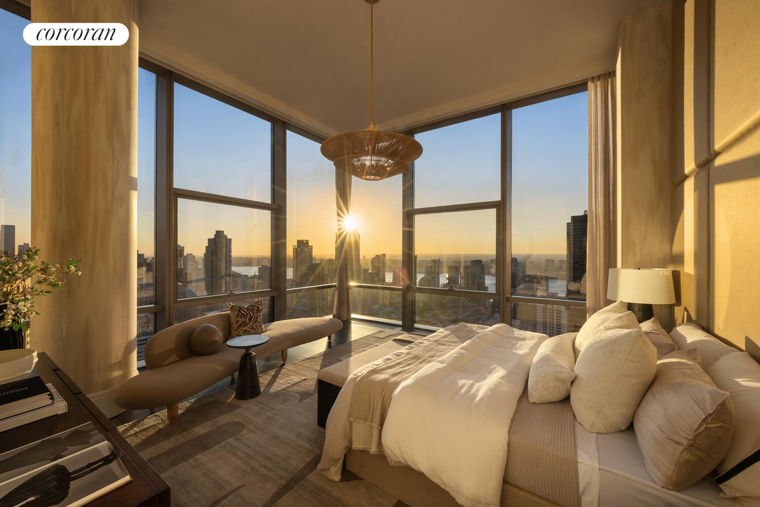 50 West 66th Street, Unit 41W Manhattan, NY 10023 - Photo 22 of 69 a bedroom with furniture and a large window