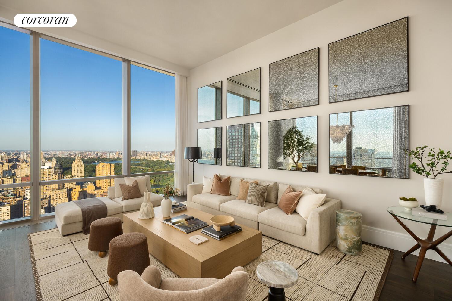 50 West 66th Street, Unit 41W Manhattan, NY 10023 - Photo 7 of 69 a living room with furniture and a large window