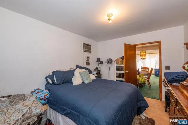 a kitchen with stainless steel appliances granite countertop a sink and a refrigerator