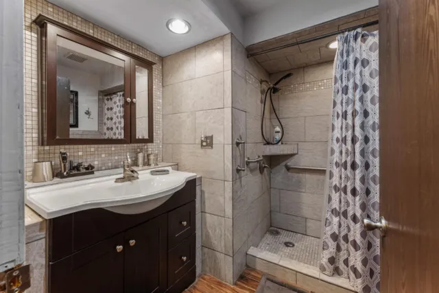 a bed room with a bed and a window