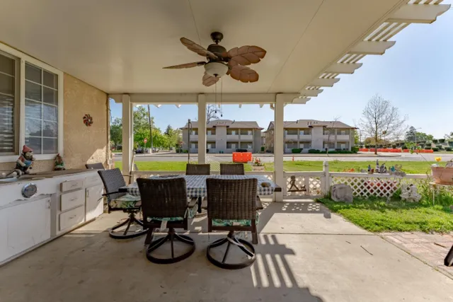 an aerial view of a house with a garden and plants